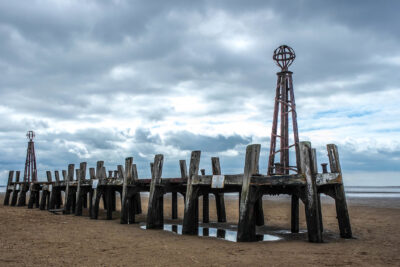 The beach at St Annes with a pier set into the sand