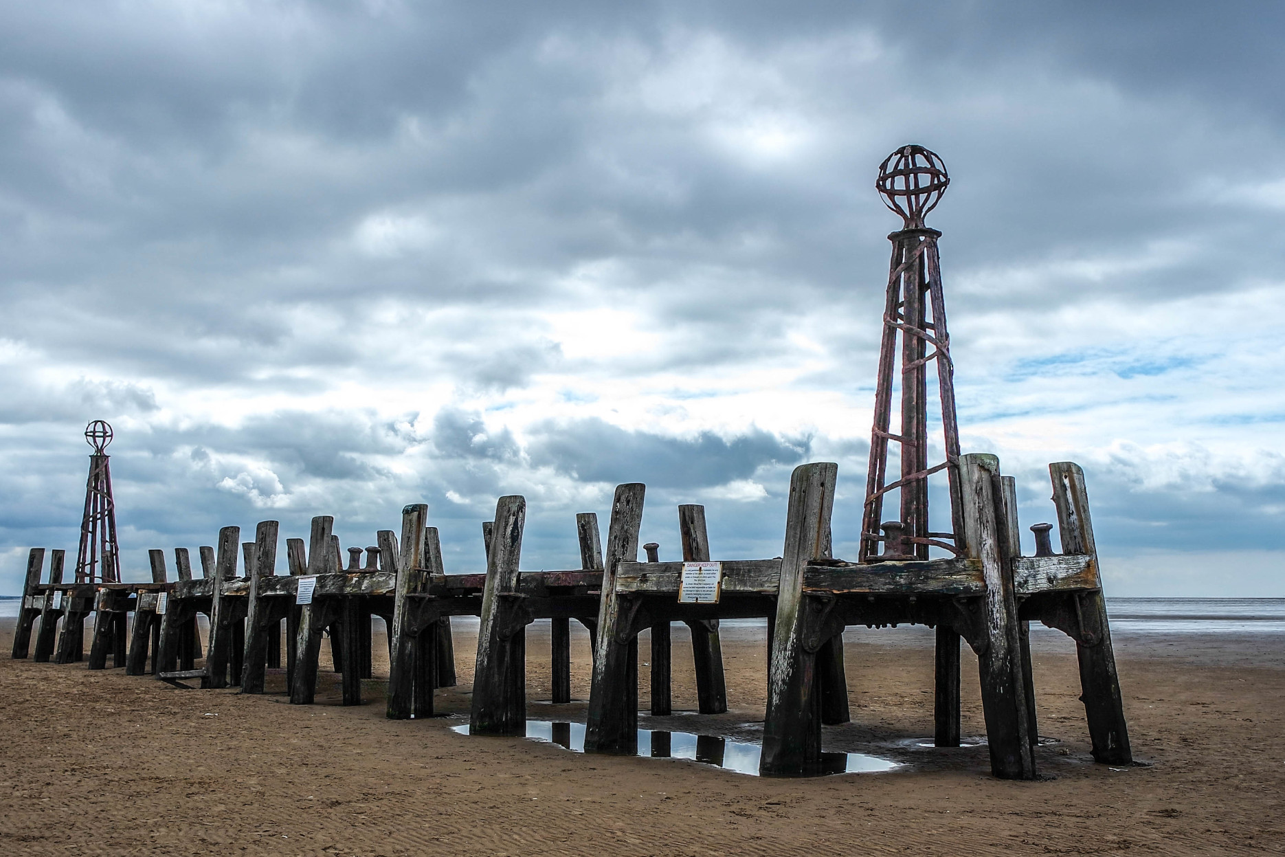 The beach at St Annes with a pier set into the sand